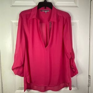 Jennifer Lopez sheer v neck blouse in pink.